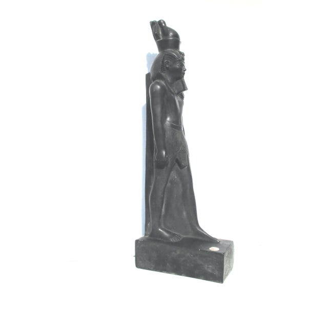 Handmade stone and resin carving of Pharaoh on carved plinth with cartouche on the face. Black stone finish with labels...