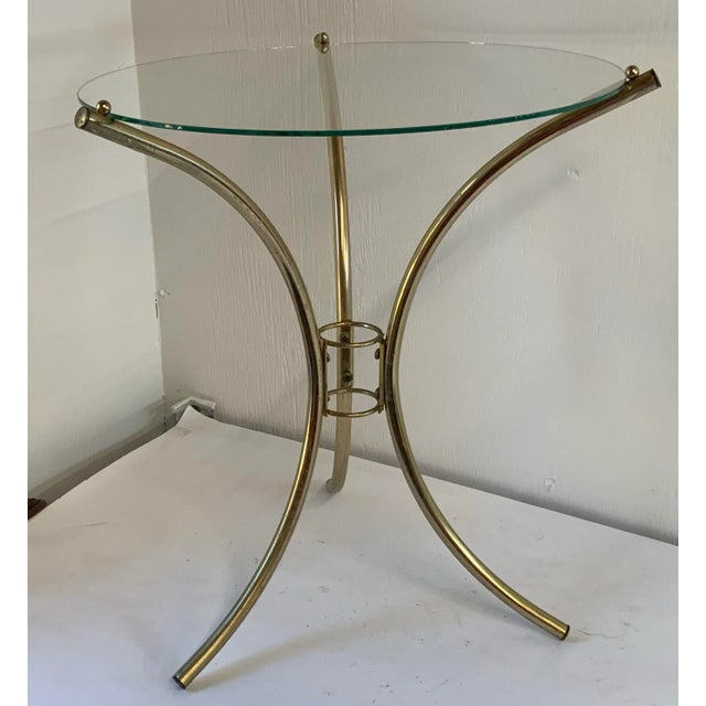 Gold MCM metal base side table or drink table with glass top.