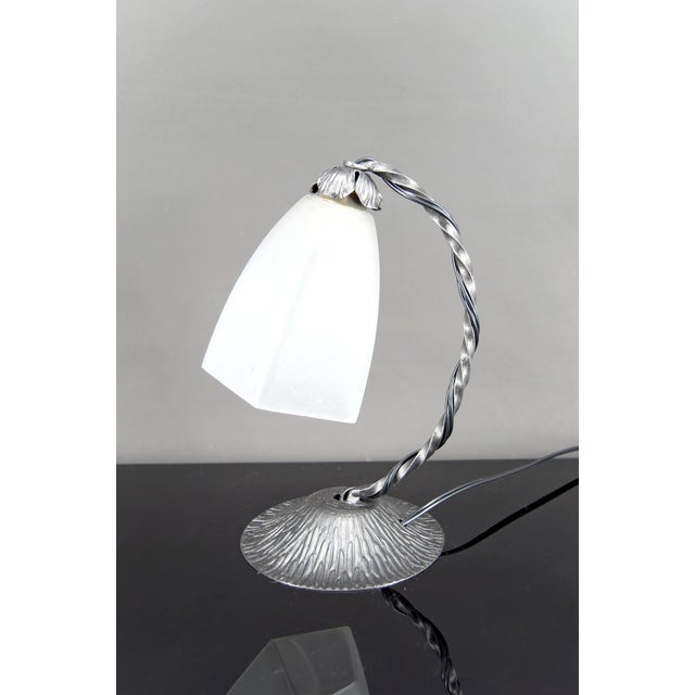 Wrought Iron Art Deco Lamp – France, Circa 1930 Elegant and authentic, this 1930s Art Deco lamp embodies the refined...