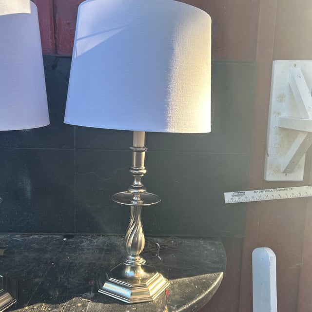 Add a touch of refined American craftsmanship to your interior with this exceptional pair of vintage candlestick buffet...