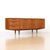 This vintage credenza was produced by McIntosh Furniture of Kirkcaldy Scotland during the 1960s. Produced in teak is a...