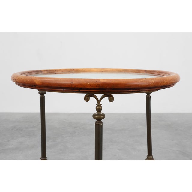 This charming French serving trolley from around 1900 brings together the warmth of walnut, the artisanal character of...