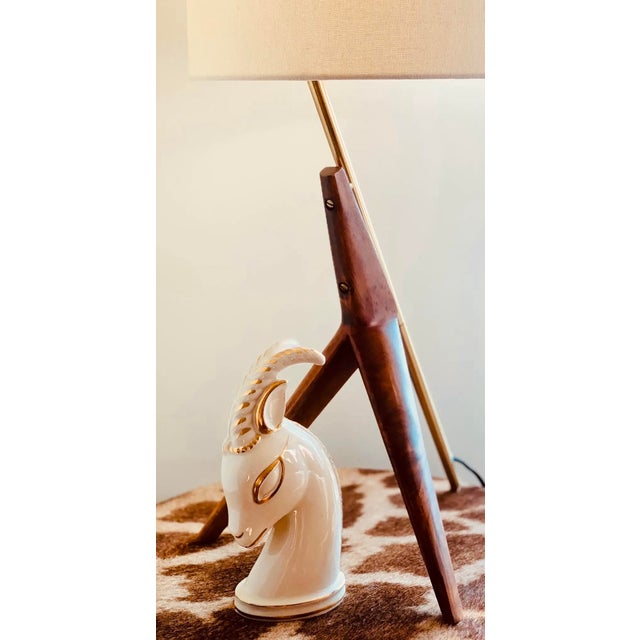 In the style of ‘Royal Haeger’ comes this Art Deco gazelle figurine made in the early 20th century. Fashioned in ceramic,...