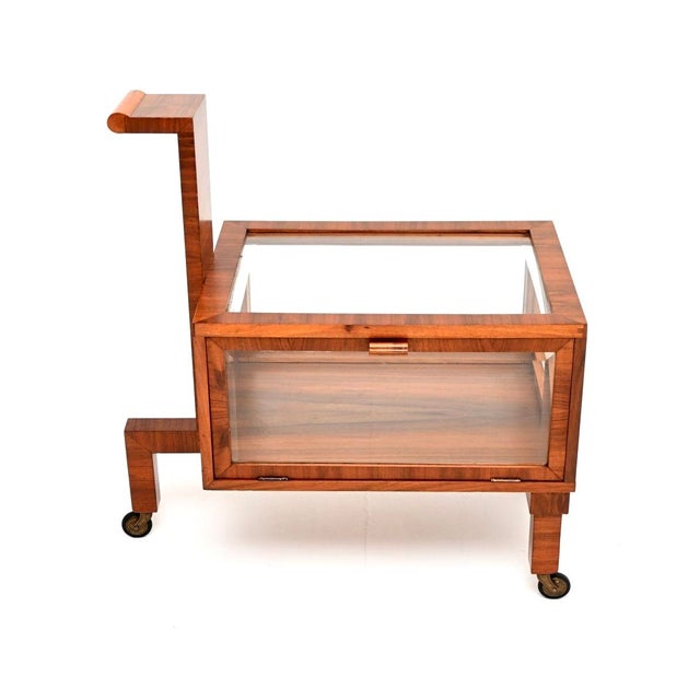 A beautiful and very unusual Art Deco walnut display case / serving cart. This was made in England, it dates from the...