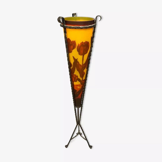 In the style of Majorelle and Muller: a gigantic glass paste lamp. Tulip decorations etched with acid. Brown colors on an...