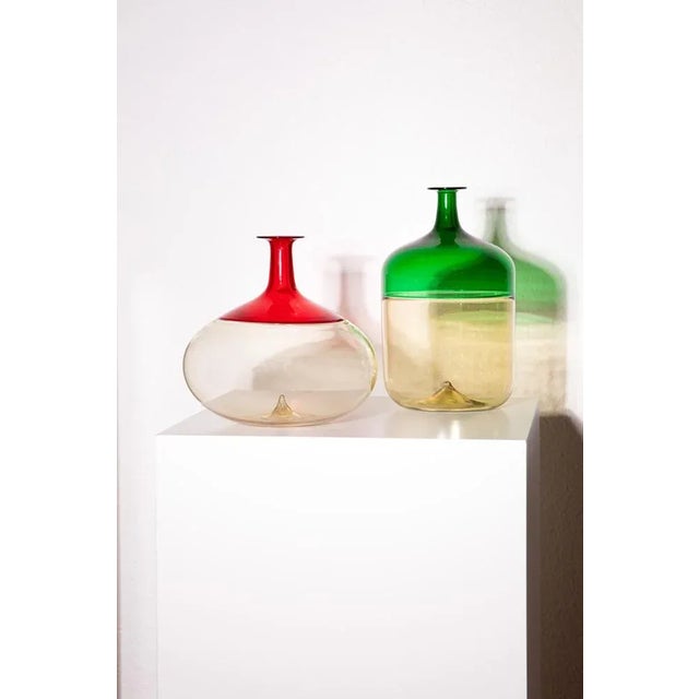 This exquisite red Murano glass vase is a stunning creation by the renowned Finnish designer Tapio Wirkkala for the...