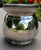 Grace your home with the timeless elegance of this exceptional antique Meriden Britannia Company silver-plated cachepot, a...