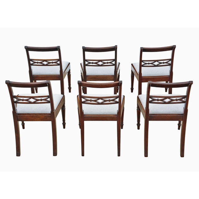 A fine set of six c.1800 Georgian mahogany dining chairs, full of lovely age and colour. This rare decorative find is rich...