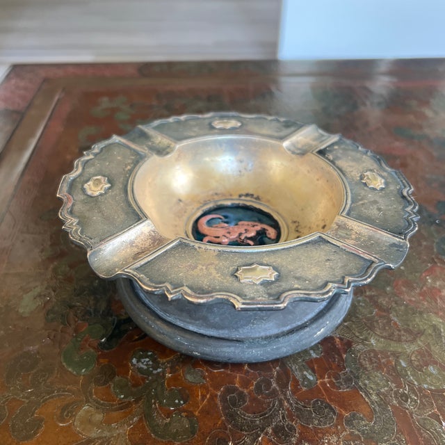 Oscar Bach Bronze & Blue Enameled Ashtray, Lizard Oscar Bach patinated bronze & blue footed ashtray. The center of the...