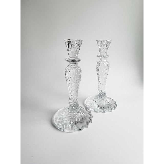 Elegant pair of authentic Waterford Crystal Sea Jewel candlesticks, showcasing the iconic twisted and diamond-cut pattern...
