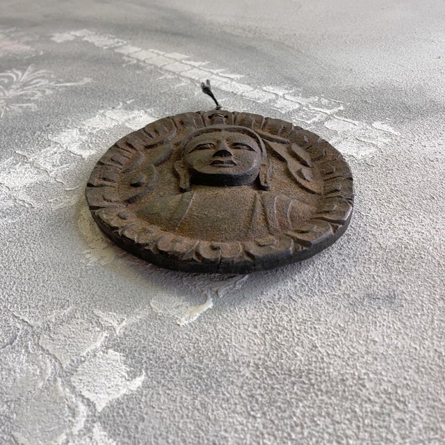 1950s Carved Wooden Wall Amulet Depicting the Buddha in the Gandhara Style with Om Symbol on the Back, 20th Century For Sale - Image 5 of 12
