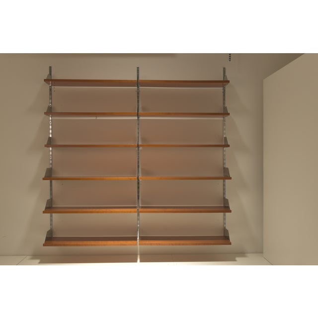 In best Quality and Workmanship produced was this adjustable Shelfsystem from Belgium in the 1960ties. The thick Teak...