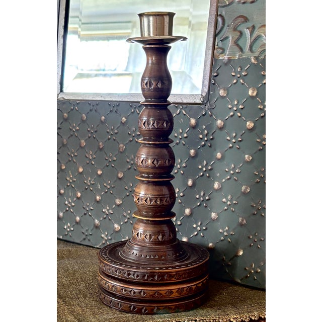 This striking wooden candlestick is a beautiful example of mid-century European folk art, brought from Germany in 1974....