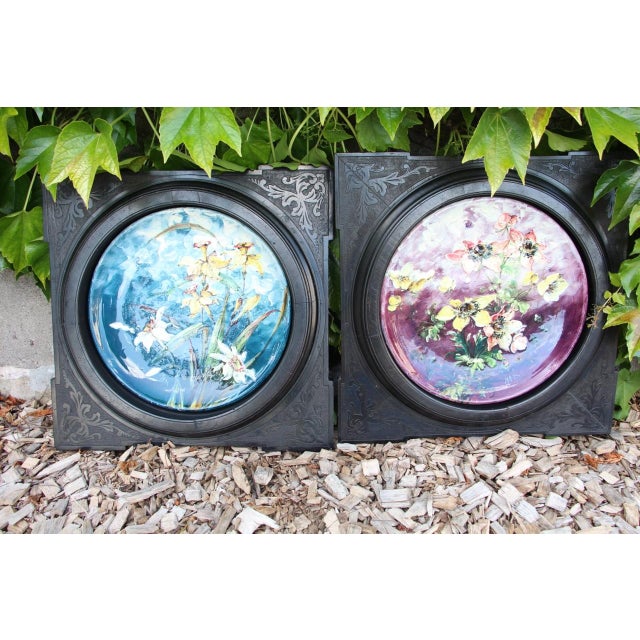 Pair of plates signed on the back by Jérôme Massier of Vallauris framed in blackened wood frames all in very good...