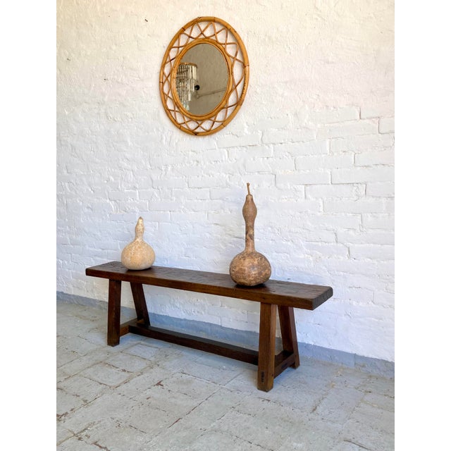 The bench is solid and sturdy, and has been carefully cleaned and treated with furniture wax.