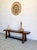 The bench is solid and sturdy, and has been carefully cleaned and treated with furniture wax.