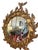 A beautifully crafted 19th century French giltwood mirror featuring an elegant circular form encircled by a hand-carved...