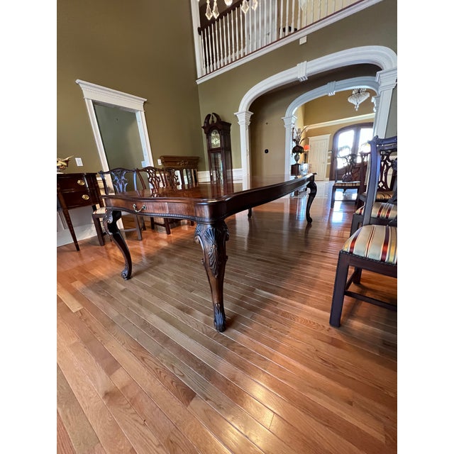 Offered is a traditional solid wood dining table by Henredon. This table features remarkable craftsmanship you would...