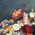This monumental oil painting on canvas is a breathtaking homage to the Dutch Golden Age still life tradition, offering an...