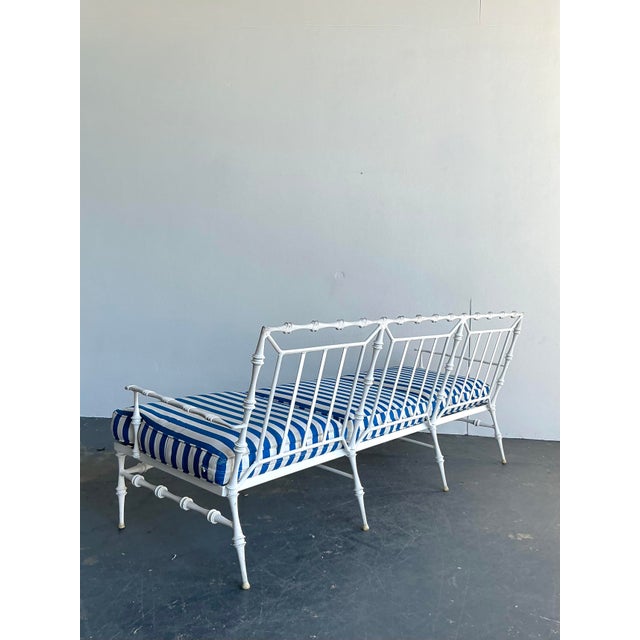 This striking vintage sofa by the esteemed Phyllis Morris is a masterful distillation of Hollywood Regency glamour and...