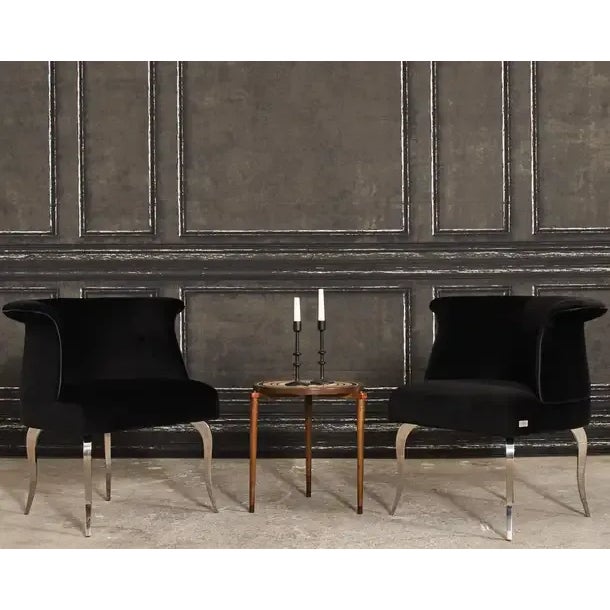 Opulent pair of plush black velvet upholstered lounge chairs by Fendi Casa. The chairs feature a tulip shaped frame that...