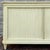 A vintage Baker Furniture Neoclassical style tambour door credenza in distressed toupe. The right cabinet can support...
