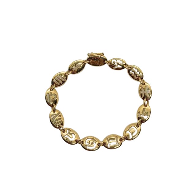 Rare and highly collectible Van Cleef & Arpels Zodiac Star Astrological Signs bracelet crafted in 18K yellow gold, dating...