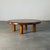 Round coffee or sofa table in solid stained pine, produced in France during the late 1960s. The design captures the...