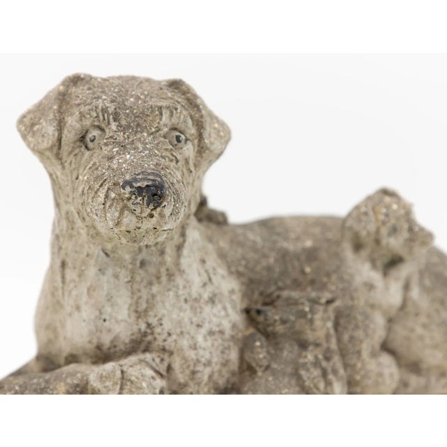 This vintage reconstituted stone garden ornament, hailing from mid-20th century England, is a charming and heartwarming...