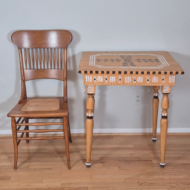 This is a rustic hand painted tall side table that measures 30.75” tall, 27.5” wide, and 23.25” deep. The table is an...