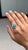 This halo cocktail ring features a 1.52 carat natural turquoise, set in 14K yellow gold. The center stone measuring 8 mm,...
