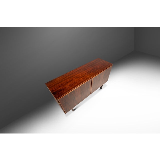 Introducing a freshly restored compact credenza designed by Carlo Jensen for Hundevad & Co. Audacious in scope, design and...