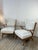 Pair of vintage 1950s wood and fabric armchairs. with their organic lines typical of mid-20th-century design, these...