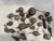A collection of charming silver plate handmade Brazilian/African charms depicting fruits and various symbols. The charms,...