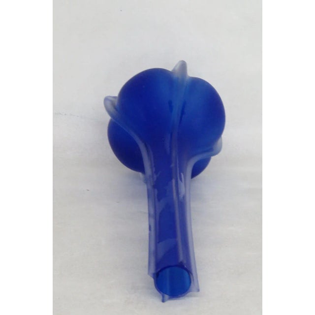 This gorgeous Vase is made out of glass. This vase has a tall, narrow silhouette with a wide rounded base; it features a...