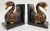 Vintage hand-carved wooden bird motif bookends featuring wonderful gilt detailing to bill and feet. Mounted to L-shaped...