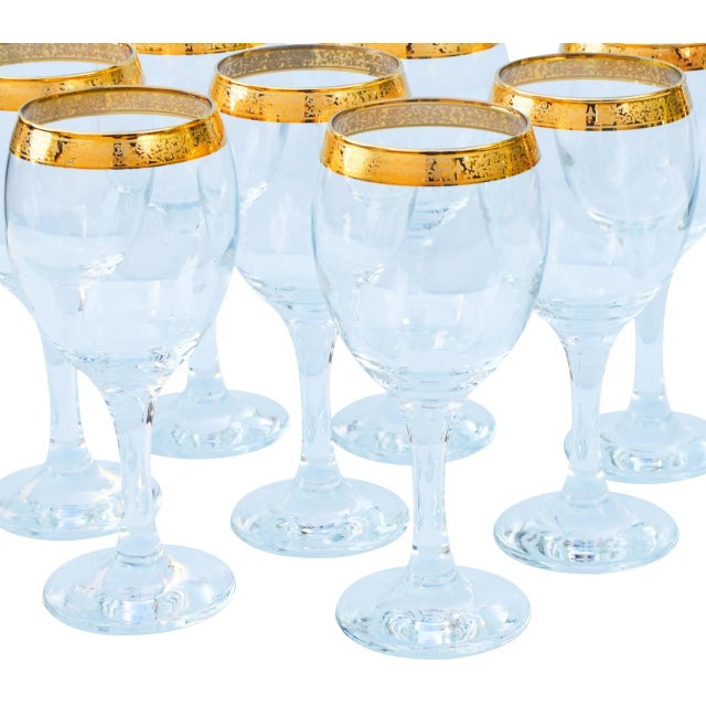 Set of eight midcentury glasses with gold detail on rim. This beautiful set ships within 1-2 business days from purchase,...