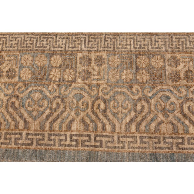 This Modern Samarkand-inspired rug beautifully channels the spirit of traditional Central Asian weaving through a...
