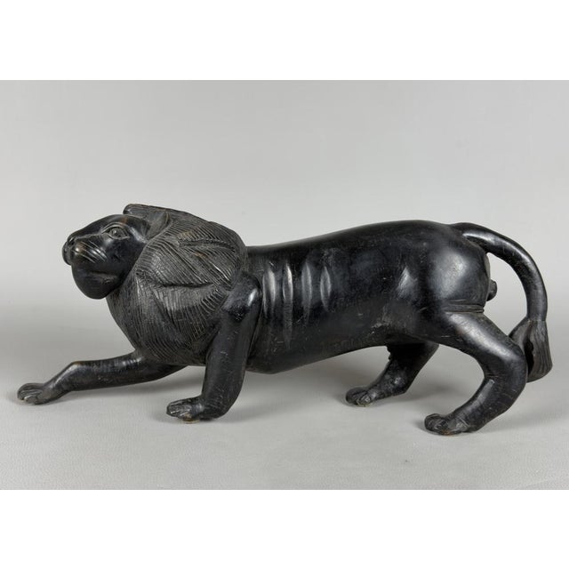 An impressive work of Italian craftsmanship dating back to the 1960s. This large sculpture of a lion features a powerful,...