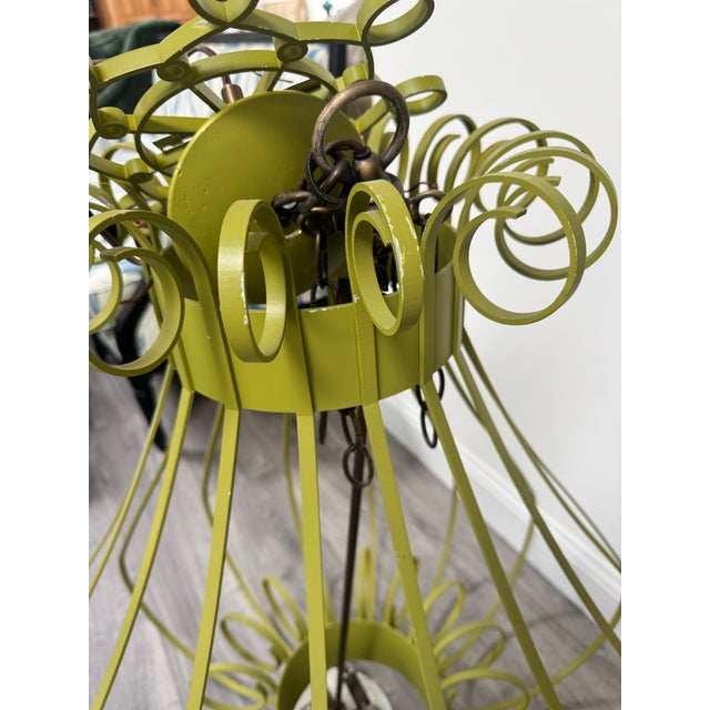 Iconic Dorothy Draper Birdcage Chandelier in a muted lime green color. Includes 3 chain links - Approximately 3”. Size:...