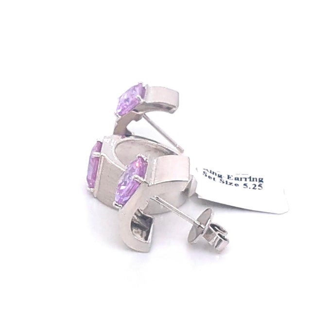 14k White Gold and Cubic Zirconia Matching Ring and Earring Set This elegant jewelry set features a wide-band ring and...
