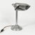 Bring a touch of mid-century industrial aesthetics to your workspace with this authentic 1940s-50s desk lamp. Crafted with...