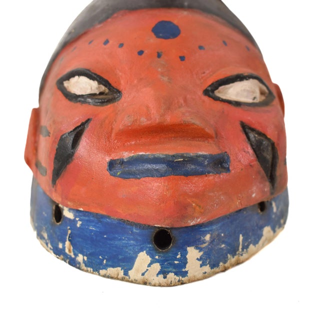 The Gelede mask, originating from the Yoruba people living along the southwestern Nigerian and Beninese border, showcases...