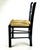 A great black lacquer side chair that is perfect for the kiddos. The wicker is in near perfect condition as shown. We...