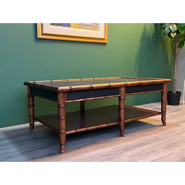 Vintage Faux Bamboo Two-Tiered Coffee Table This is solid built faux bamboo side table with a beautiful mica etched top...