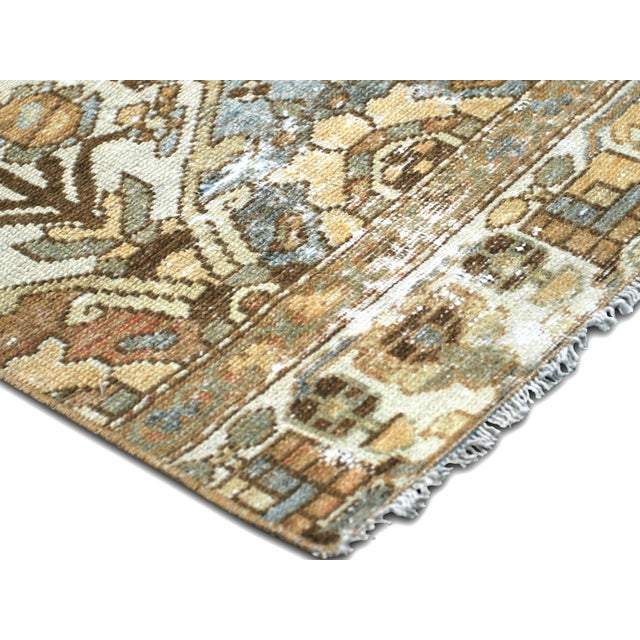 This Semi Antique Persian Baktiari Yastic is a hand-knotted rug made from a blend of wool on cotton for an extra-durable...