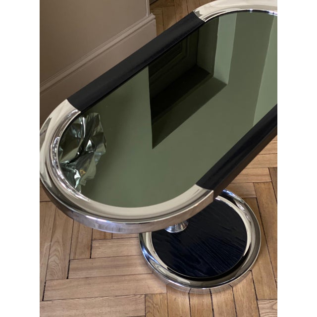 This console table design historically was known as a smoking table. It is as trendy today as it was in mid century,...