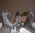 This heavy, solid bronze figurine features three spirited stallions expertly joined to form a single integrated tripod...