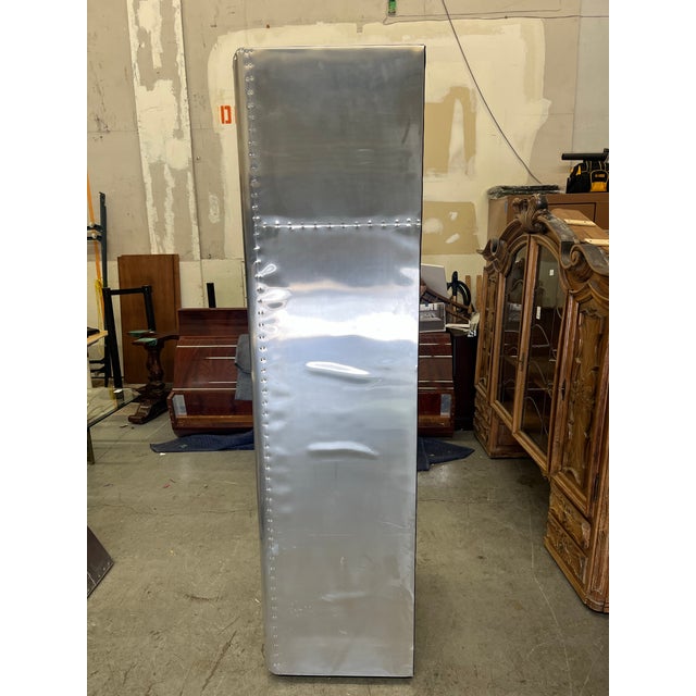 The Restoration Hardware “Aviator” Narrow Shelf brings iconic industrial style and functional design to any space....