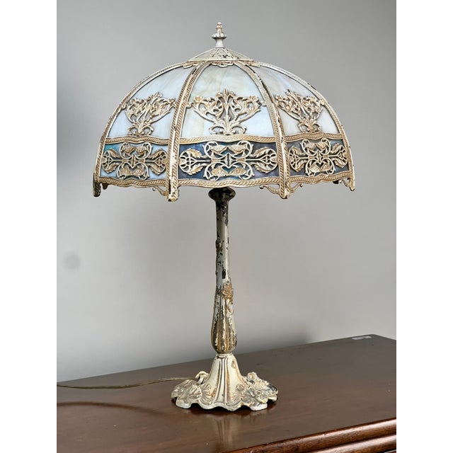 Inspired by the flowing lines and organic ornament of the Art Nouveau movement, this elegant two-light table lamp captures...